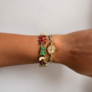 GOLD TONE CHRISTMAS THEMED CHARM BRACELET